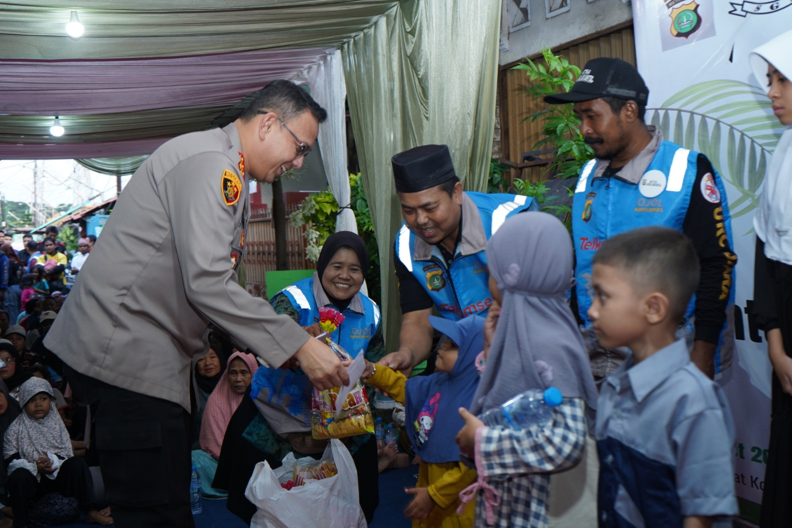 Kapolres Metro Jakarta Utara Hadiri Buka Puasa Bersama dan Santunan Anak Yatim Bersama Komunitas Ojol