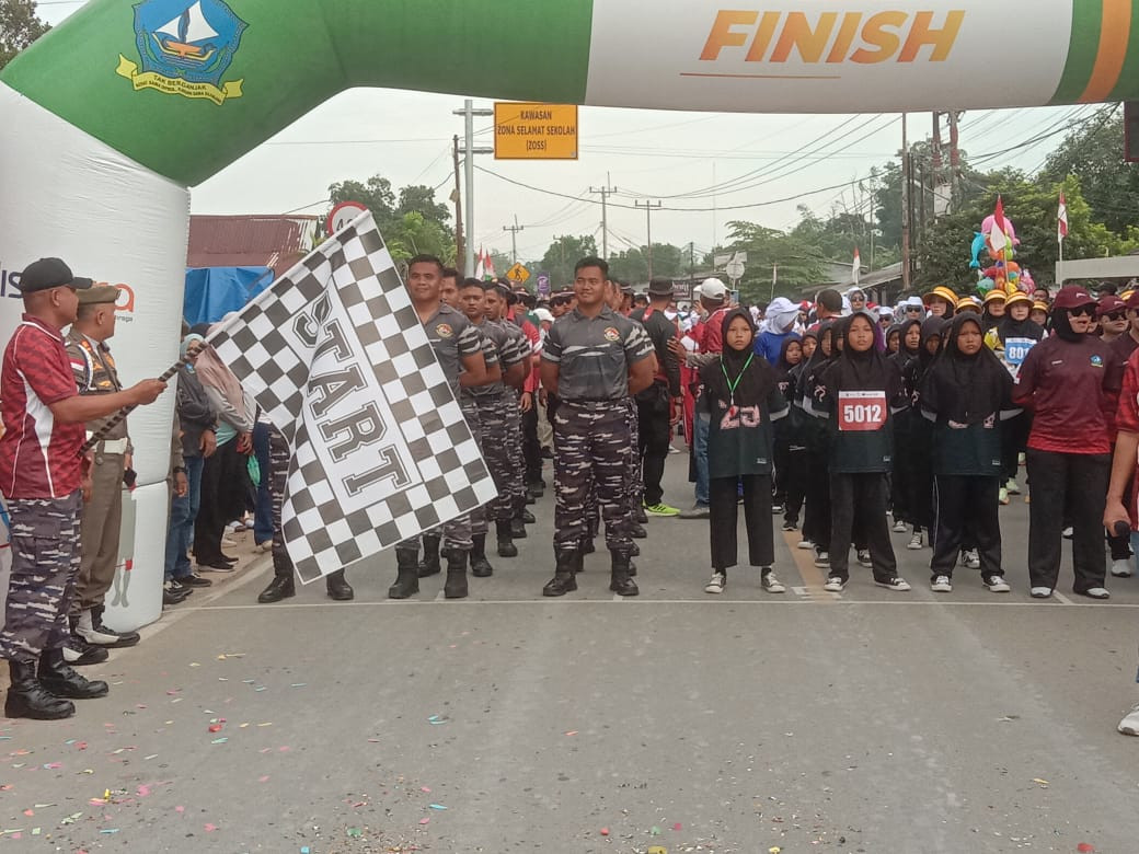 Prajurit Lanal Bintan Turut Serta Semarakkan Lomba Gerak Jalan Tri Lomba Juang