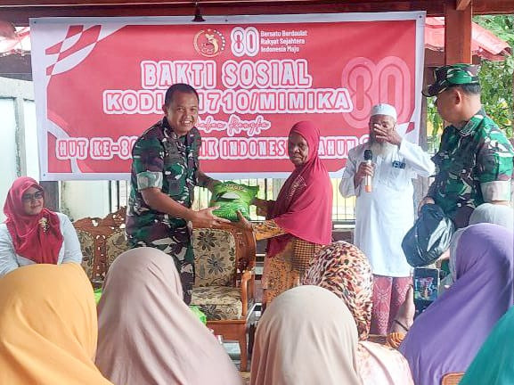 Sambut HUT RI Ke-80 Tahun 2025, Kodim 1710/Mimika Gelar Bakti Sosial Bagi Sembako Kepada Kaum Dhuafa Dan Mualaf