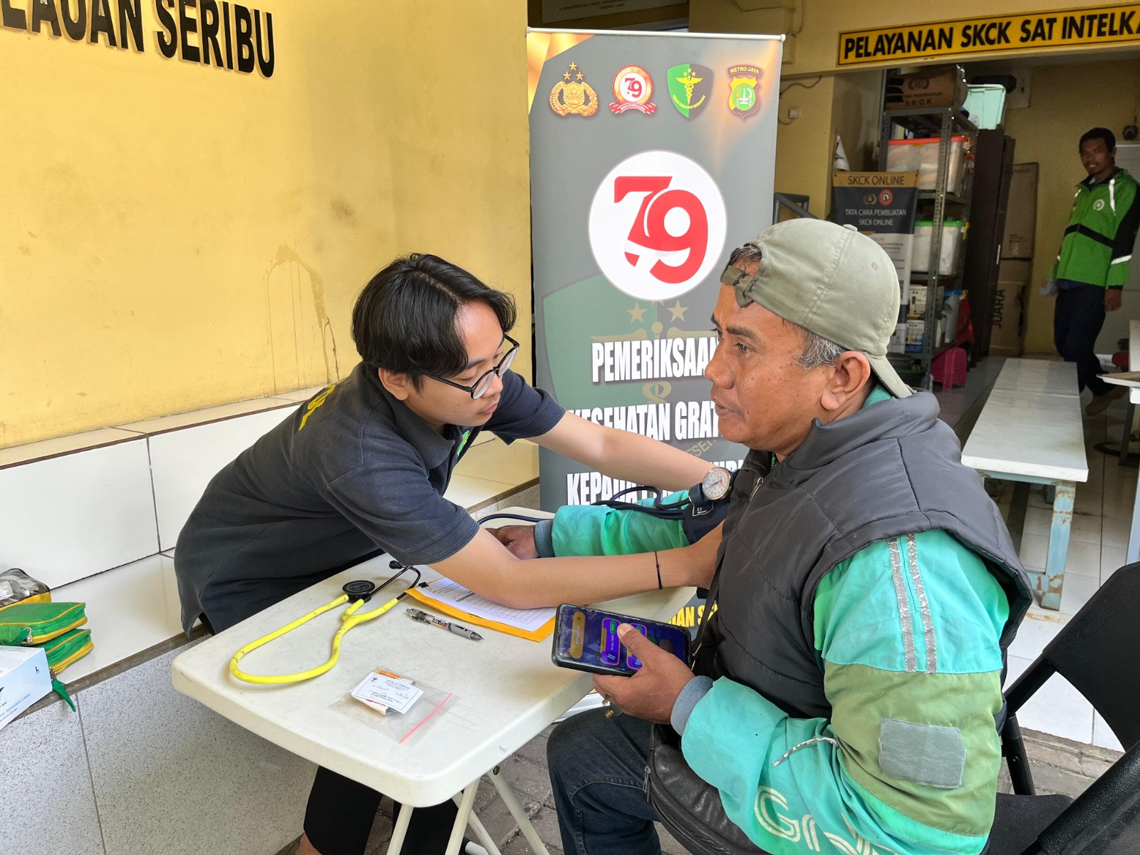 Sambut Hari Bhayangkara ke-79, Pemeriksaan Kesehatan Gratis Digelar untuk Pengemudi Ojek Online